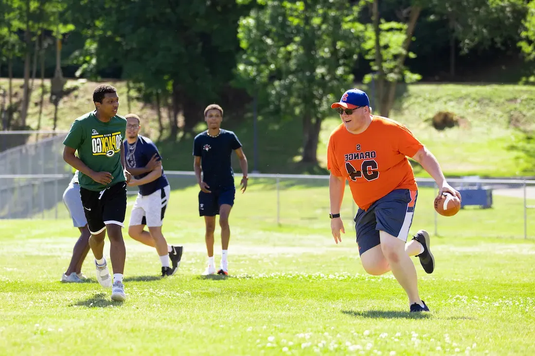 Students playing touch football.